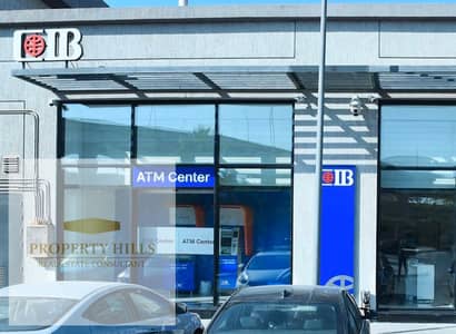 Bank for sale, ready for viewing, in Fifth Settlement, in a prime location, price available in installments.