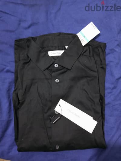 قمصان  Calvin Klein