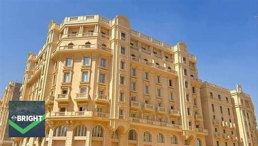 استلام فوري بالتقسيط وبدون أوفر | أقل مقدم لشقة 117م متشطبة بالكامل في New Garden City | بالقرب من مدينتي وسراي