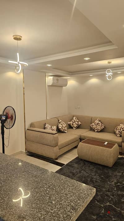 Furnished studio available for one year, branching off from Tahrir Street