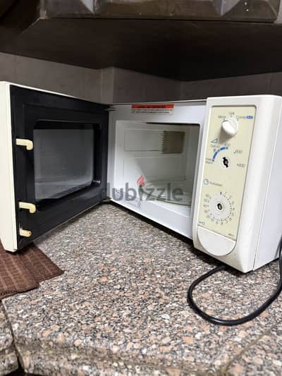 مايكرويف Whirlpool microwave & grill