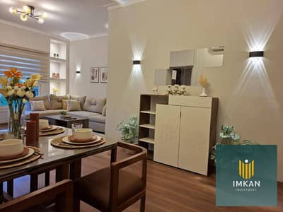 Fully finished apartment for sale in Jade Compound, featuring a view of a spacious garden and facing the East Market; available with a down payment of