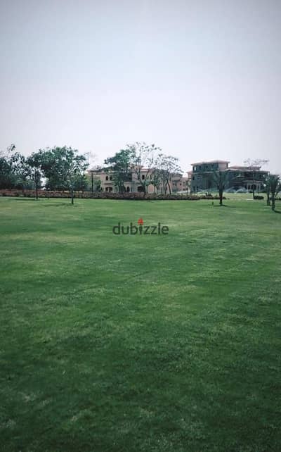 For rent in Madinaty, a standalone villa model (E) in a prime location with a golf view.