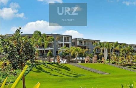 Next to JW Marriott Hotel and facing Cairo Airport ground floor apartment with garden for sale best phase in Taj City next to Taj Sultan