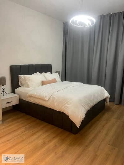 A distinctive 155-square-meter furnished apartment for rent in the Mivida compound, Fifth Settlement. It is located near Cairo Festival City
