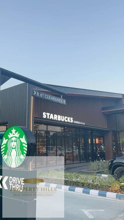 A restaurant front store on directly south 90