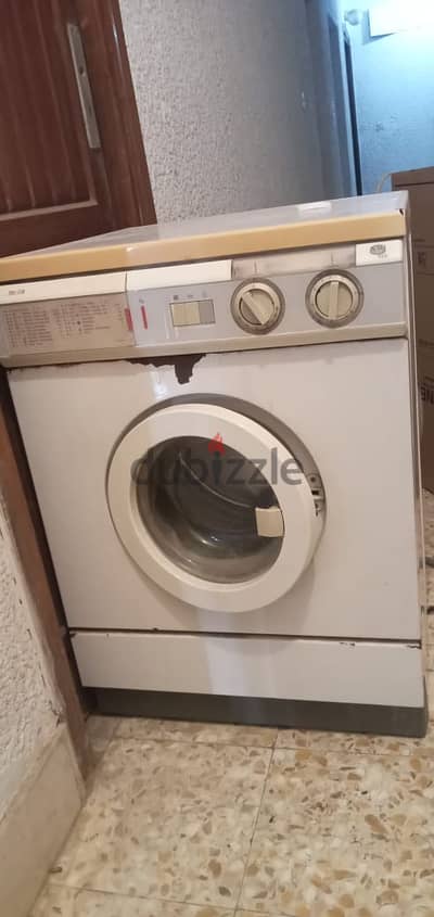 غسالة إديال زانوسي