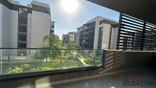 For rent: Unfurnished 133 sqm unit in Privado, Madinaty. Located on the second floor with a garden view, it includes a kitchen and underground parking
