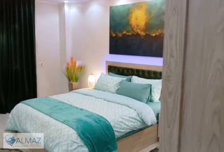 Fully furnished, 200-square-meter apartment for rent in Al-Masrawiya Compound, Fifth Settlement; located directly on South 90th Street.