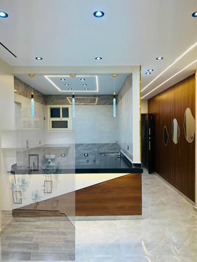 Two apartments for sale with a front of 150m in the best locations of Al-Ahram Gardens
