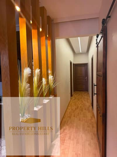 Selling a ground apartment with a garden in Fifth Square at a steal price!! 160 sqm with a 66 sqm garden, heavily price-dropped—asking 16,800,000 EGP, with flexible payment plans available!!