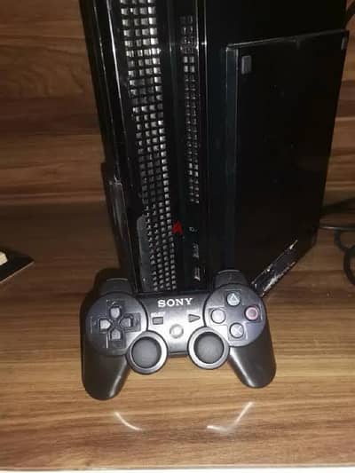 ps3 fat شغل ١٠٠٪؜ حالتة محترمة مع دراعين واسطوانة