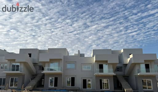 Corner townhouse villa for sale in V Levels Compound, Sheikh Zayed, in front of Beverly Hills