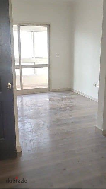 Apartment for sale in Sheikh Zayed, Mostakbal Buildings by DORRA – First floor, prime façade, north-facing, with a double view.