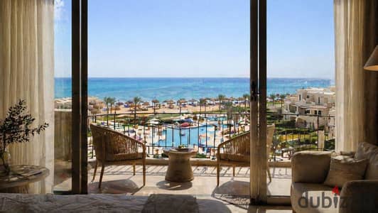 Panoramic sea & pool view chalet, fully finished with furniture, for sale with installments in a premium resort in Ain Sokhna.