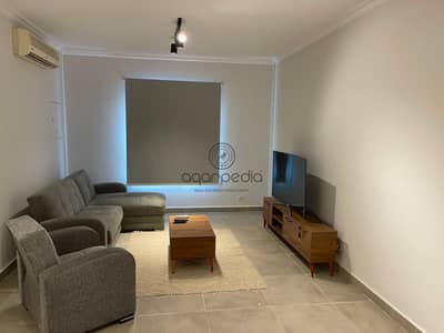Fully furnished apartment for rent in Celia New Capital 120 sqm 2 bedrooms first use with equipped kitchen prime location modern living
