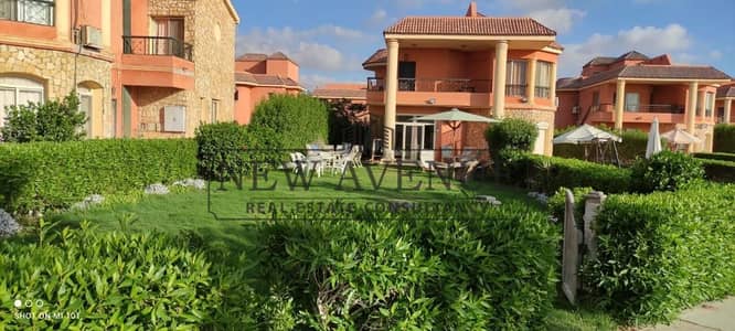 Ground chalet for sale in Blumar North Coast, Phase 1, walking distance to the beach. 120 sqm BUA + 300 sqm garden, 3 bedrooms, 2 bathrooms.