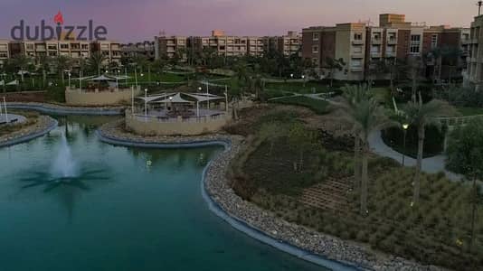 شقه بحديقه باطلاله علي مساحه كبيره خضراء و بحيره فى IVY  نيو جيزه  بالقرب من Six West بيفرلي هيلز اركان بلازا الشيخ زايد