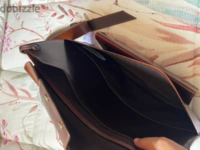 شنطة جلد طبيعى جديدة لم تستعمل نهائى