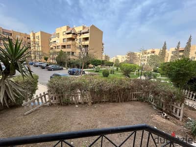 Furnished ground-floor apartment with a garden for rent in Al Rehab, near Gateway Mall; 145 square meters.