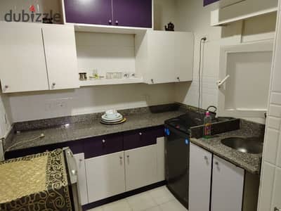Studio in a garden with a private entrance, furnished, air-conditioned, Compound of Hadayek Al-Continental, Sheikh Zayed