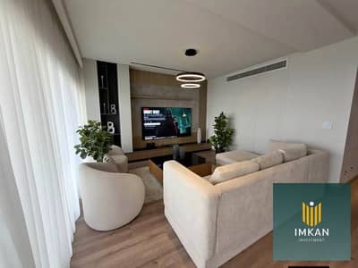 A fully finished 4-room apartment for sale in Al-Shorouk at a special price, with a 10-year installment plan and views of the landscape and swimming p