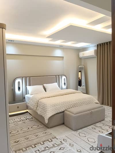 Furnished, air-conditioned hotel-style apartment next to City Stars, available for daily and monthly rent for families. Excellent location in Nasr Cit