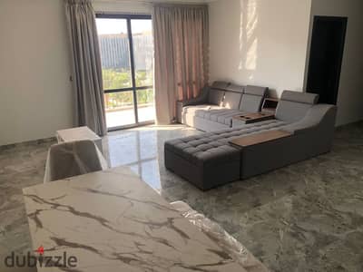 Furnished apartment for rent in Eastown Compound; prime location and custom finishing.