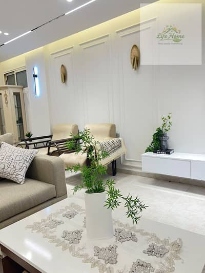 Furnished apartment for rent in Al Rehab, two bedrooms, ground floor with garden, Phase 4