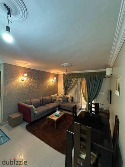 Furnished apartment for rent in Madinaty in B6 with wide garden view