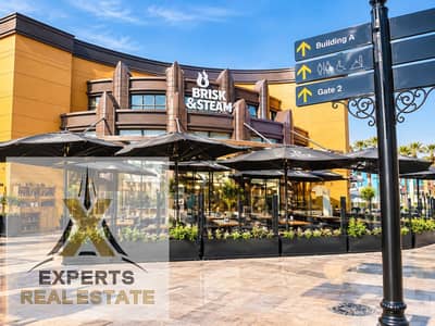 Restaurant & Café for Sale in Open Air Mall, Madinaty | 99 sqm Ground Floor Facing the Main Entrance | Highest Rental Rate per sqm | Commercial Unit