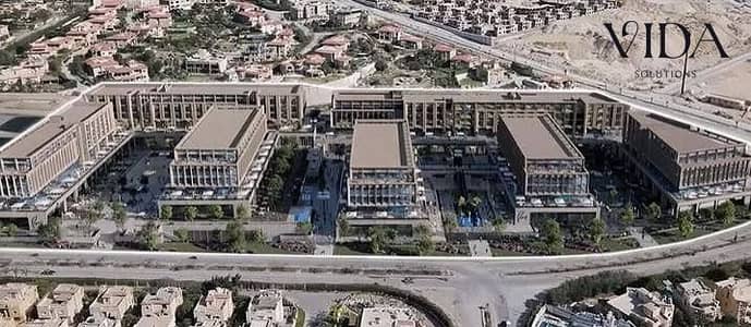 Finished 46m² clinic for sale in Ink Mall, Eastern Expansions, Palm Hills Plateau; available via an 8-year installment plan.