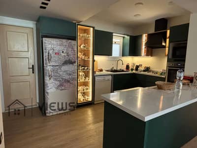 شقة 160م + 65م حديقة للايجار بالمطبخ و التكييفات بكمبوند ماونتن فيو اى سيتي Mountain view i city