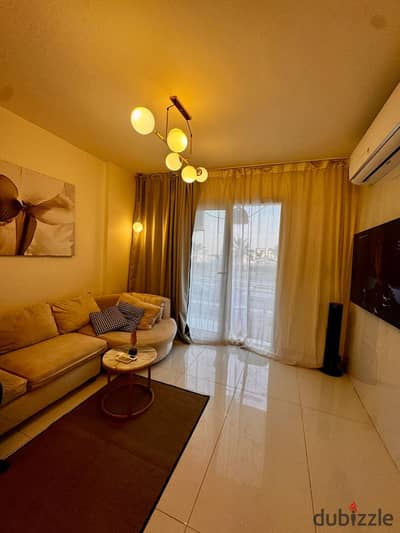 Furnished apartment for rent in Madinaty, Phase 12 (B12), with high-end finishes, hotel-style furnishings, and full air conditioning.