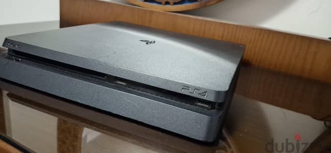 PS4 Slim 500GB. Excellent Condition + Original Controller and Cables