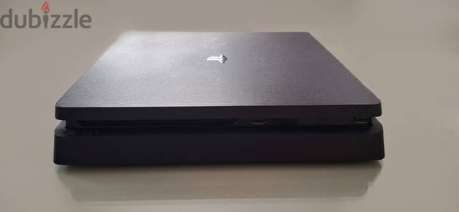 PS4 Slim 500GB. Excellent Condition + Original Controller and Cables
