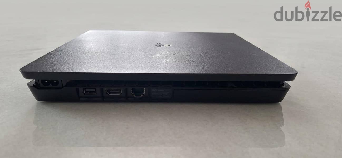 PS4 Slim 500GB. Excellent Condition + Original Controller and Cables 3