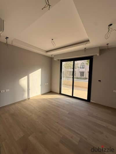 Apartment for Sale in Village West Sheikh Zayed – Ground Floor with Garden