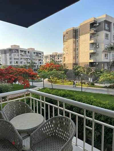 Apartment for sale in Madinaty’s prime B10 phase; features "extra super deluxe" finishing and a garden view. Ideally located on a desirable floor near