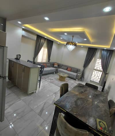 Distinctive furnished apartment for rent in the Seventh District, Sheikh Zayed