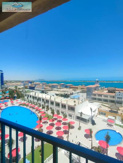 Chalet for sale in Porto Marina, two-bedroom chalet, two bathrooms, full reception, sea view, sixth floor, Tower 5