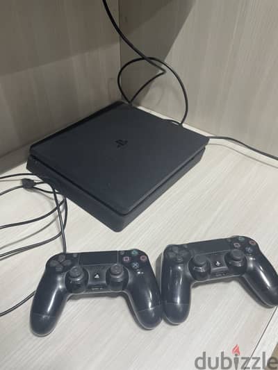 Sony PS4 Slim 1TB Console + 2 Original Controllers - Great Condition
