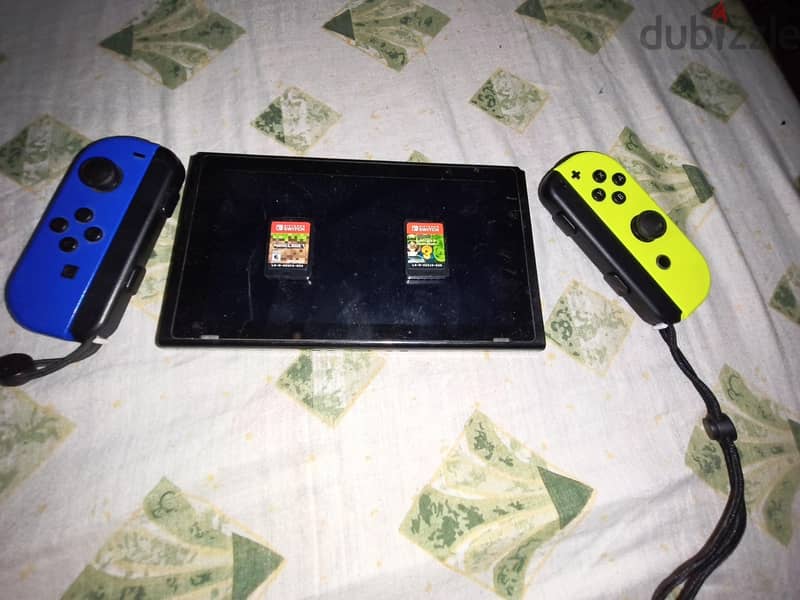 Nintendo switch + 2 games 1