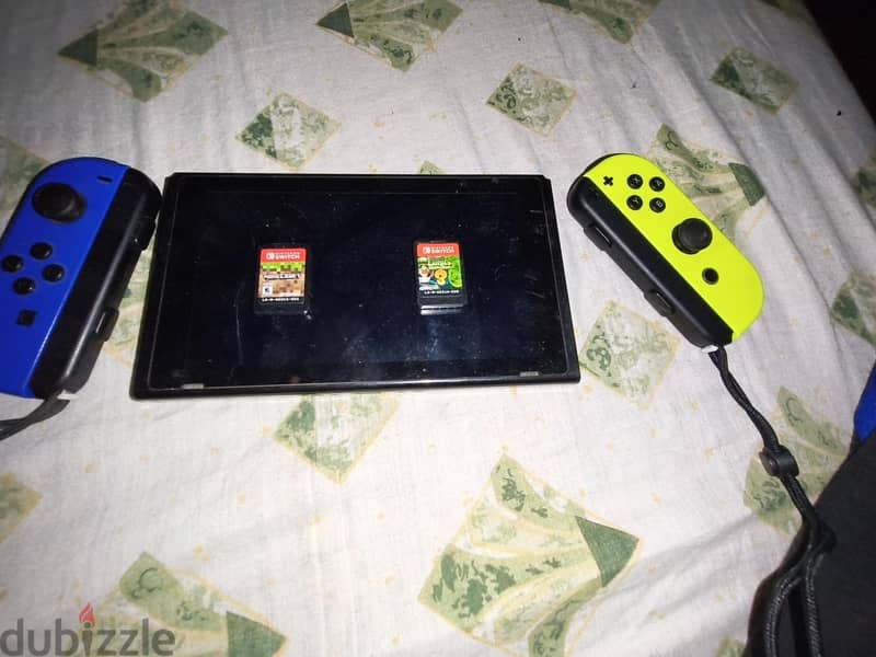 Nintendo switch + 2 games 3