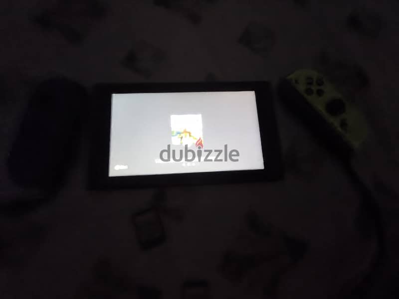 Nintendo switch + 2 games 4