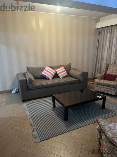 Furnished apartment for rent, air-conditioned, in Zahra Al-Maadi, second section, area 130 m, consisting of 2 rooms - reception - kitchen - 2 bathrooms - floor 1, no elevator, finishing