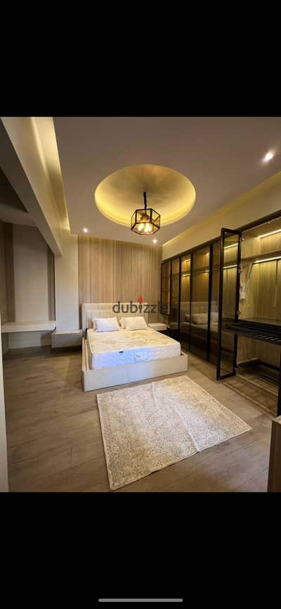 For rent: a luxury hotel apartment, VIP, in a strategic location in Jasmine Villas, First Settlement