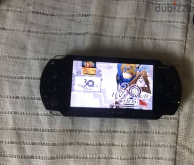 PSP-1003 حوالي 50 لعبه -كالجديد
