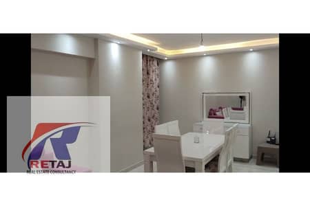 Furnished apartment for rent in Degla Towers Compound; features two bedrooms, one bathroom, ultra-luxurious finishing, and modern furnishings.