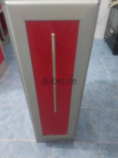 دولاب الموتيل للحفظ زجاجات الزيت